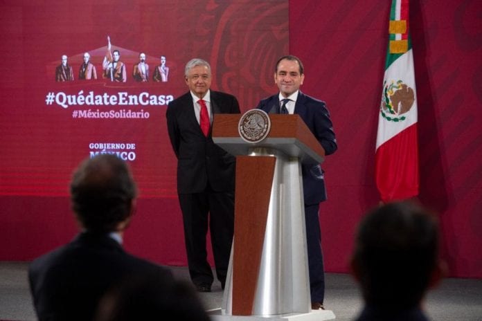 Andrés Manuel López Obrador y Arturo Herrera