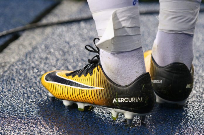KYIV, UKRAINE - JULY 26, 2017: Close-up boots (Nike Mercurial) of footballer Derlis Gonzalez of FC Dynamo Kyiv during UEFA Champions League 3rd qualifying round game against Young Boys